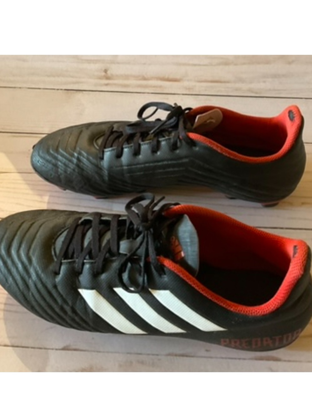 adidas Black Soccer Cleats with White Stripes and Red Interior
